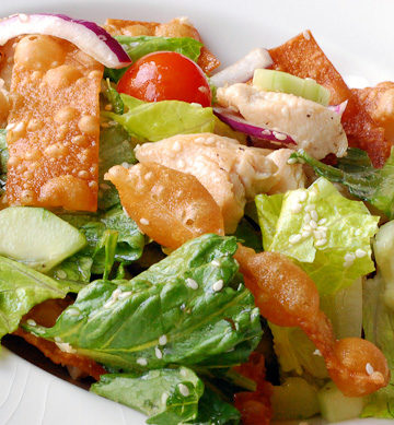 This Asian Wonton Salad is delicious with a sweet sesame dressing and homemade Wonton crisps!