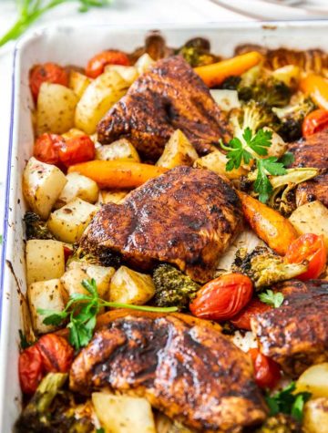 baking pan full of roasted chicken and veggies