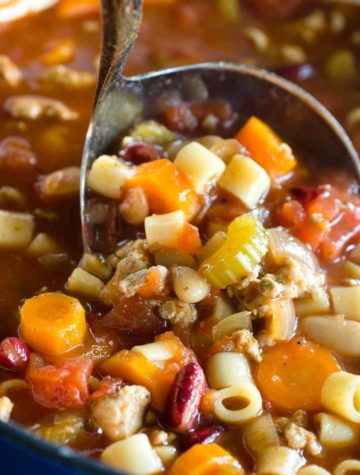 pasta soup in ladle