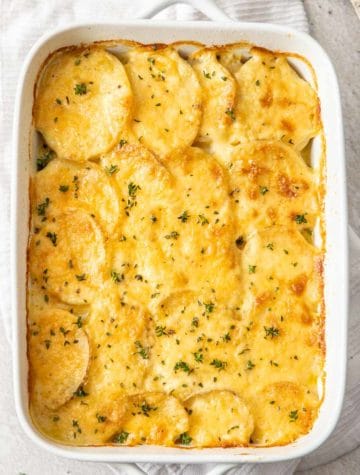 scalloped potatoes in white dish
